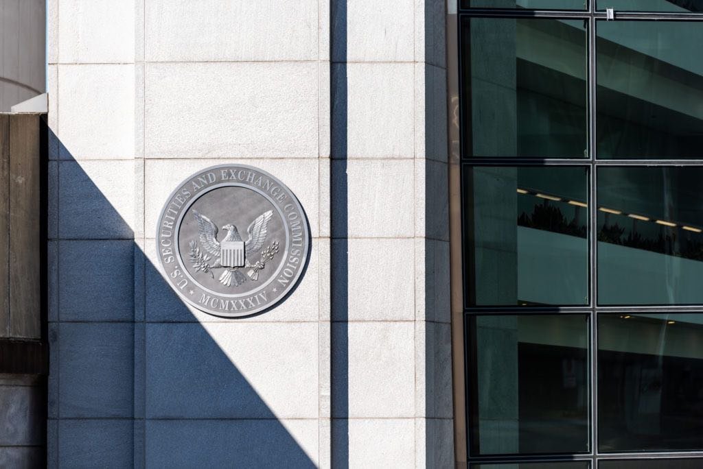 Washington DC, USA - October 12, 2018: US United States Securities and Exchange Commission SEC entrance architecture modern building closeup sign, logo, glass windows