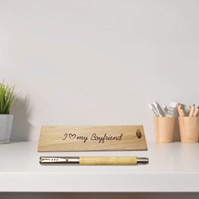 If you are looking for a unique and special gift for your loved one, consider getting them a wooden pen and pen stand. This gift is perfect for anyone who loves to write or take notes. Not only is this gift a beautiful addition to your loved one’s desk, but it is also practical and can be used for a variety of tasks. If you are considering getting your loved one a pen stand, engrave it with a cute text to add a personalised touch.