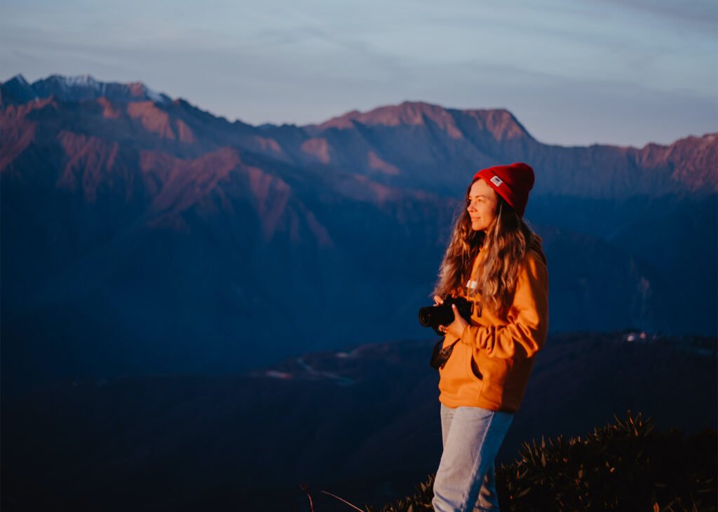 Photographer in a national park in the mountains.