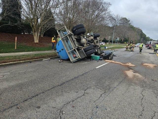 Wastewater truck overturns in Cary, driver taken to hospital - WRAL News