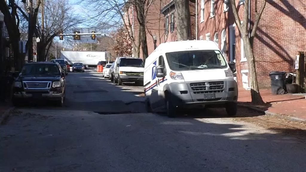 Sinkhole opens up underneath mail truck on Wilmington, Delaware street; several nearby homes evacuated - WPVI-TV