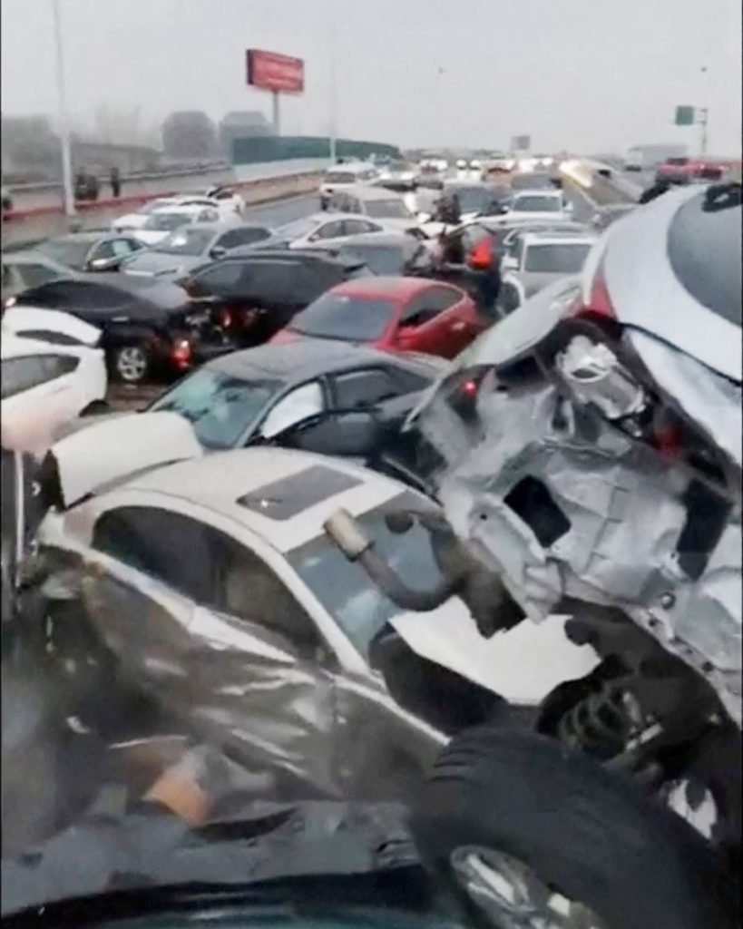 Several injured in 100-car pile-up on icy overpass in China - NBC News
