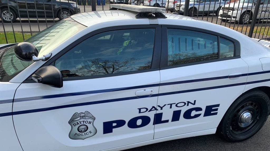 Man hospitalized after being trapped after car flipped over in Dayton - WHIO