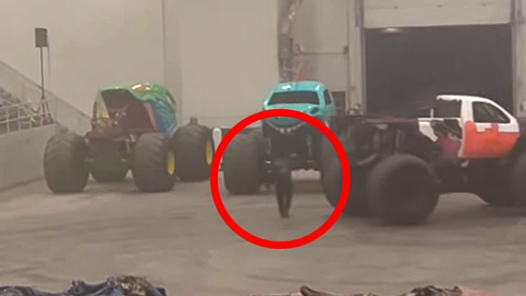 Monster truck runs over worker as crews rush to free victim - Daily Mail