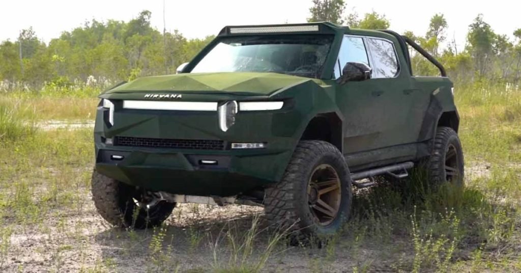 This custom Rivian has been fit with a lift kit, kevlar paint, roll cage - Electrek