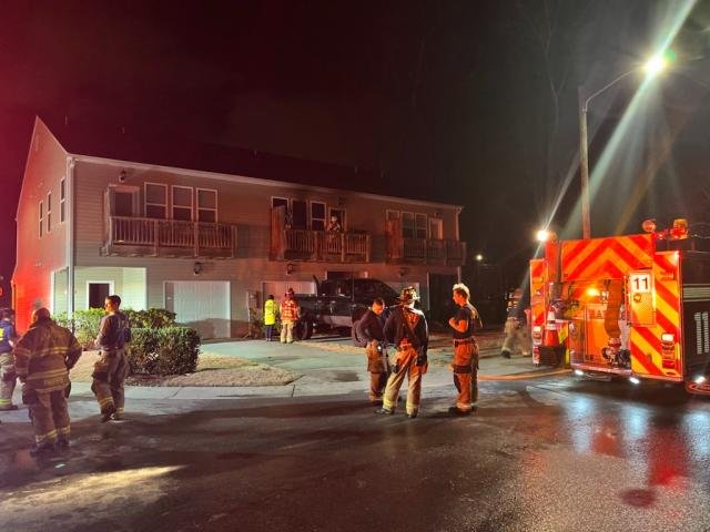 Raleigh resident escapes townhouse fire by jumping from balcony onto truck bed - WRAL News