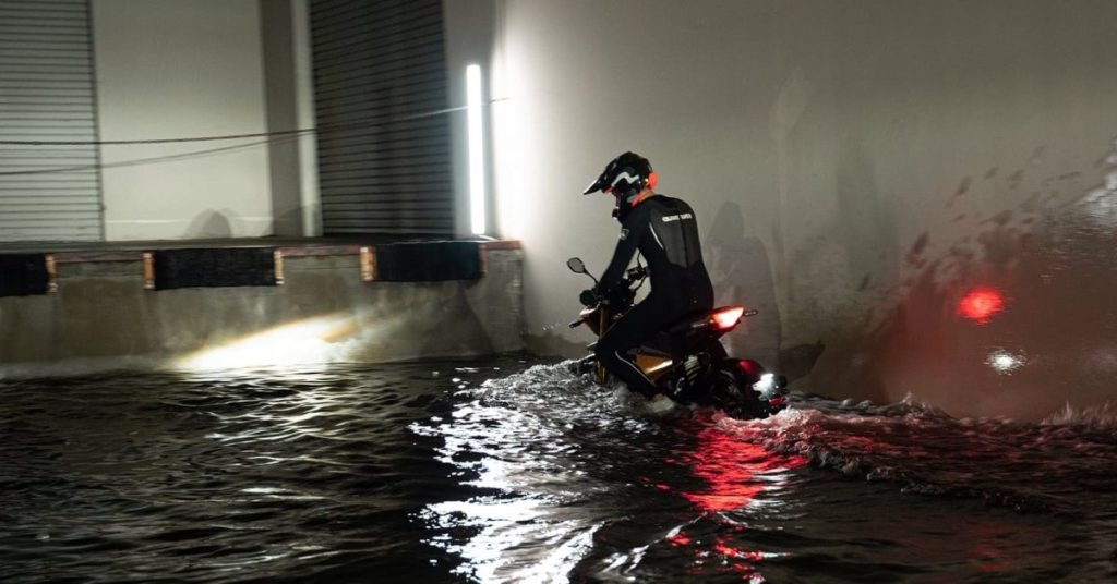 Watch this electric motorcycle ride battery deep through California flood waters - Electrek