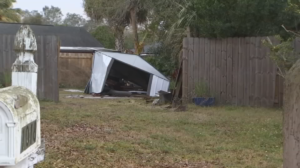 Woman recalls moment speeding car crashes into neighbor’s shed while running from police - WFTV Orlando