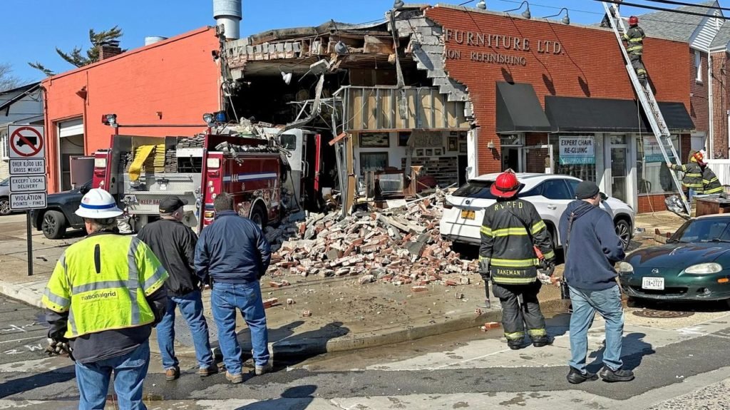 4 injured when fire truck crashes into Rockville Centre store while responding to call - Newsday