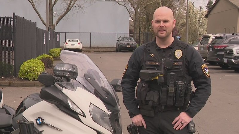 Tigard officer who survived motorcycle crash that sent him airborne shares safety message - KOIN.com