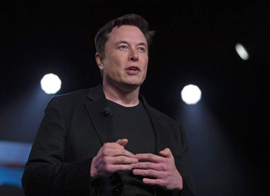 Elon Musk insists Tesla isn't a car company as sales falter - Yahoo Finance