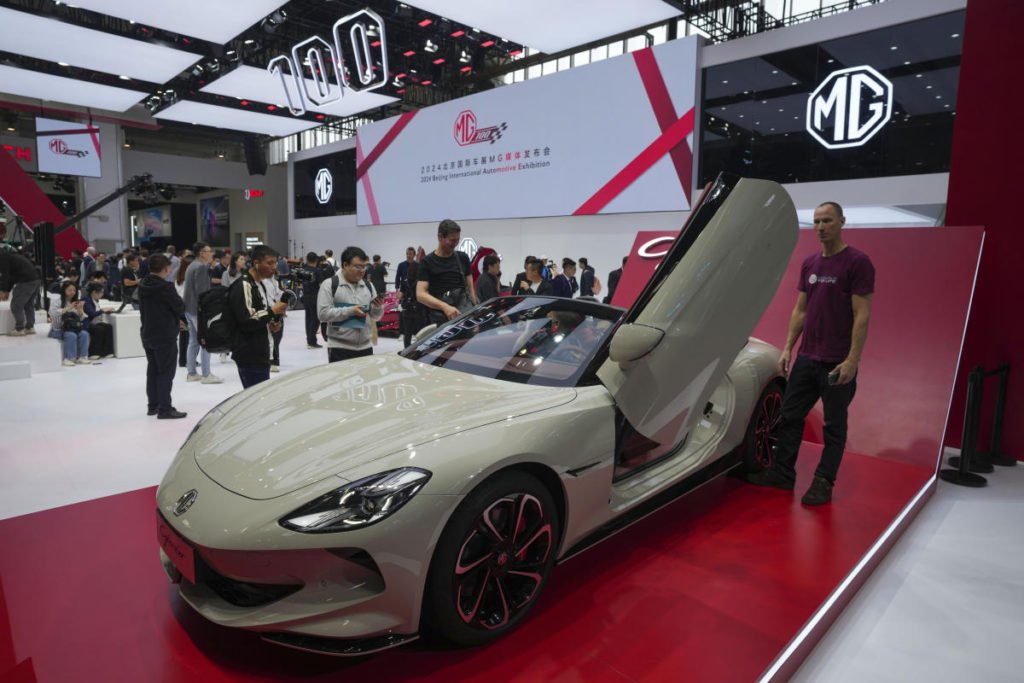 Electric cars and digital connectivity dominate at Beijing auto show - Yahoo! Voices