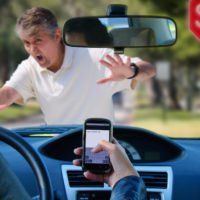 An irresponsible texting driver is about to run over a pedestrian at an intersection which shows how dangerous texting and driving is. Stop the text and stop the wrecks.